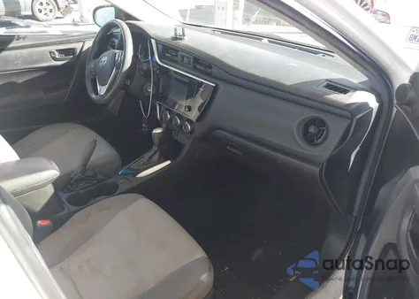 2017 Toyota Corolla L z USA, uszkodzony, nr VIN 5YFBURHE7HP656375